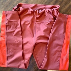 ATHLETA yoga pants L orange. Worn once. Ultimate 7/8 tight. Draw strong at waist